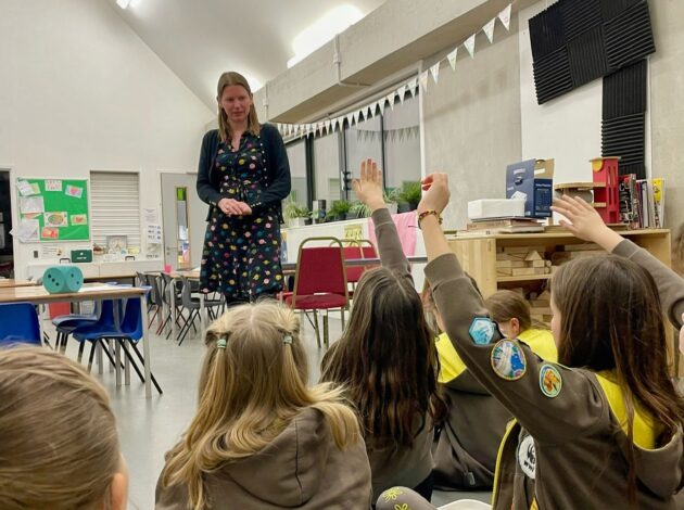 Photo of Mary Gregory talking to school children about STEM.